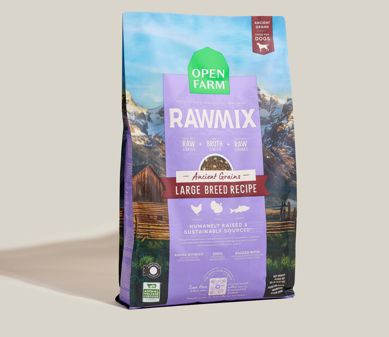 Open Farm Rawmix dog food package with mountain and cabin design on a beige background