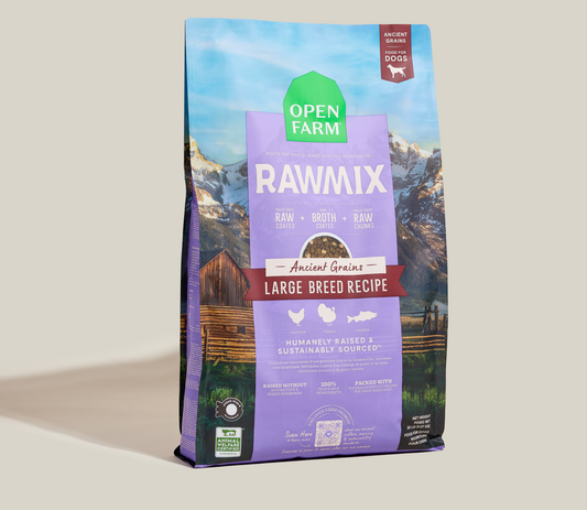 Open Farm Rawmix dog food package with mountain and cabin design on a beige background