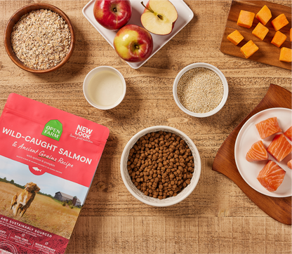 Dog food packaging with ingredients on a wooden table
