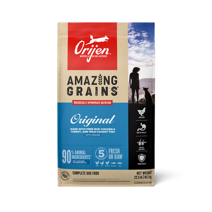 Orijen dog food package with a person and dog on a beach